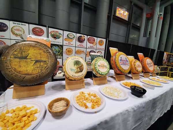 Table display of various cheese from around the world.